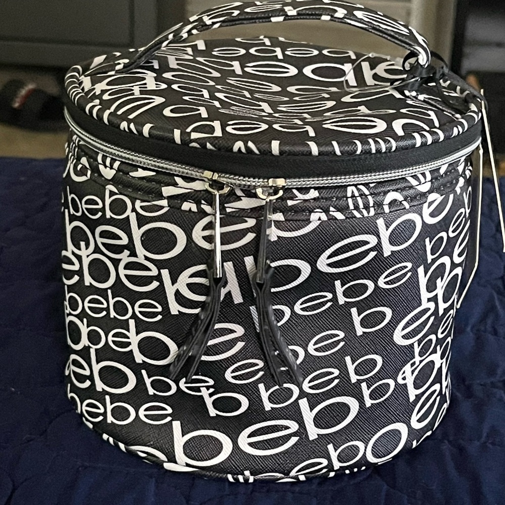 Bebe black & white cosmetic zipper bag.